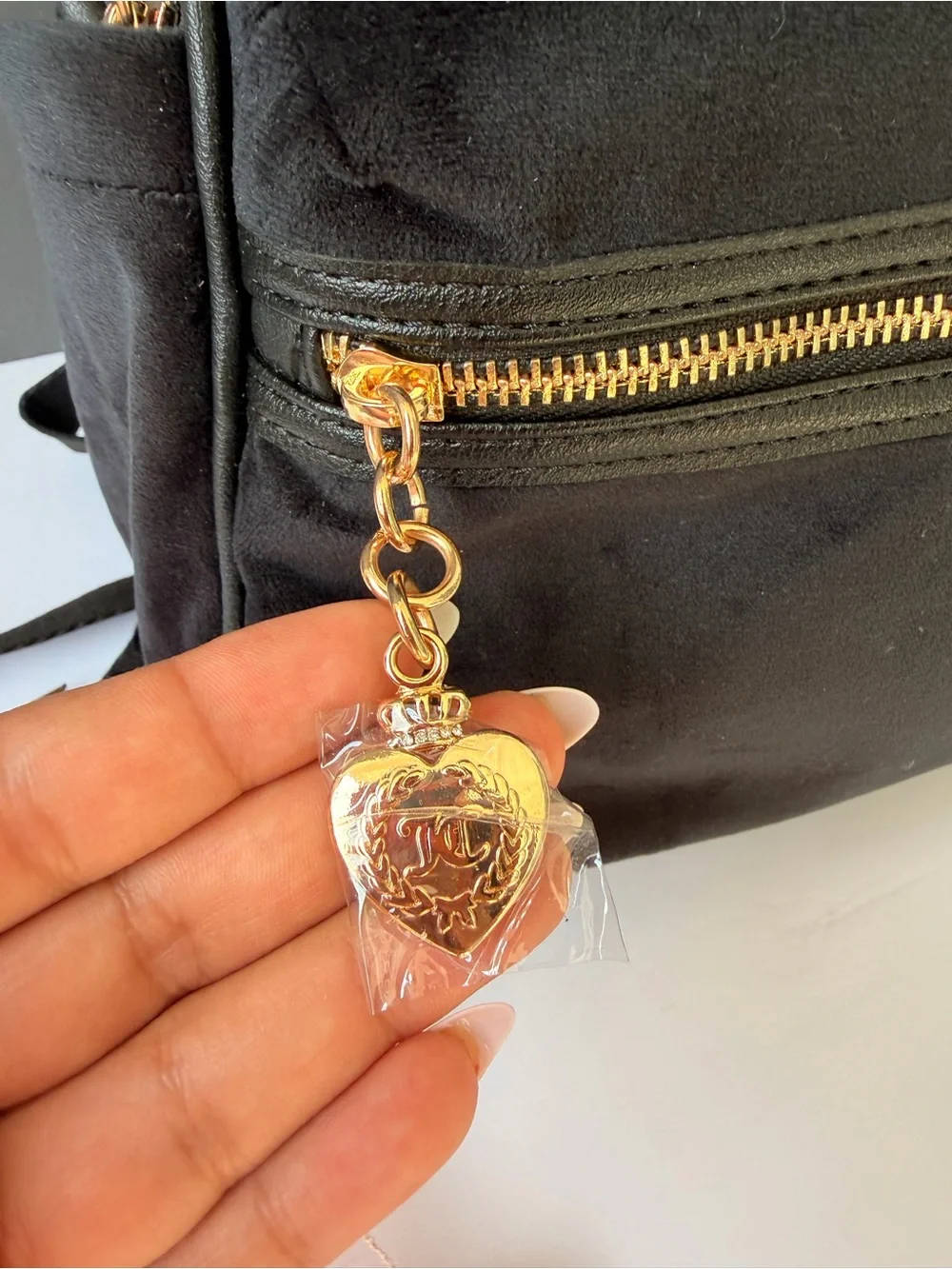 Juicy Couture Black Logo Velvet Backpack with Gold Hardware and Pink Charm